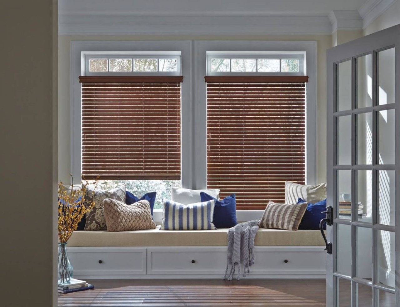 Hunter Douglas Wood Blinds in a Window Above Bench Seating and Throw Pillows near Nashville, TN